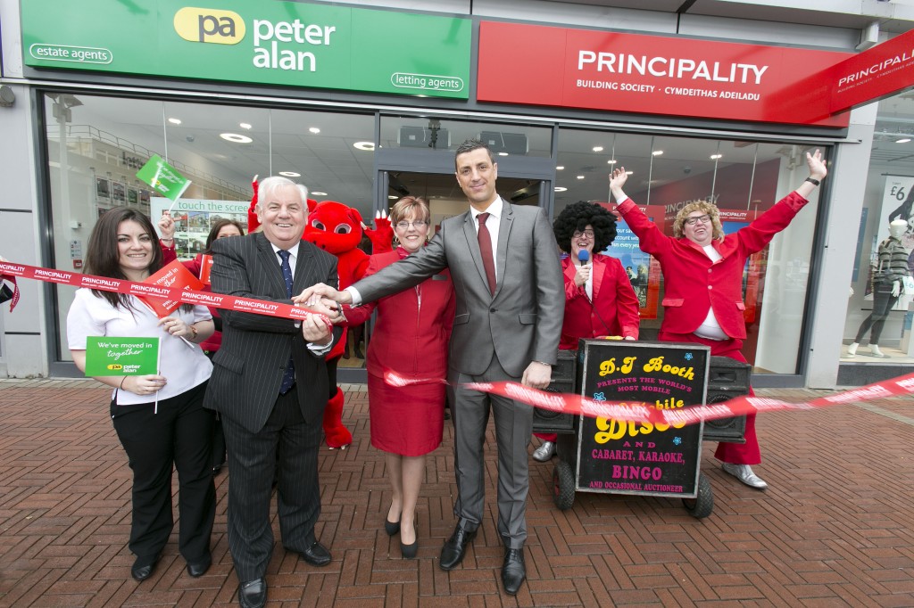 Principality Chairman Dyfrig John with Principality Branch Manager Ceri Thomas and staff from Peter Alan officially opening the Cwmbran branch in 2013.
