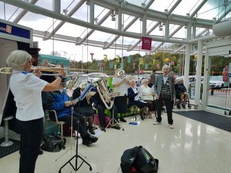 Reg joined in with the Salvation Army band on his last day in work