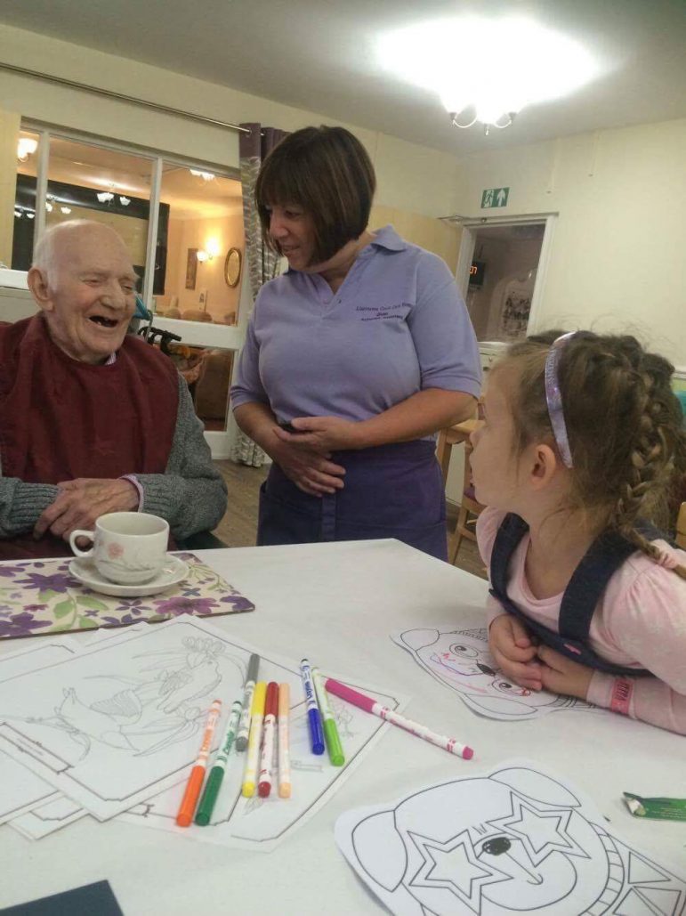 Children from Llanyrafon Nursery play games with residents at Llanyravon Care Home