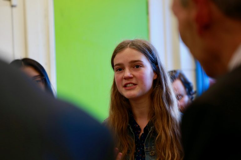 A young person asks a question to assembly members in Cwmbran Centre for Young People