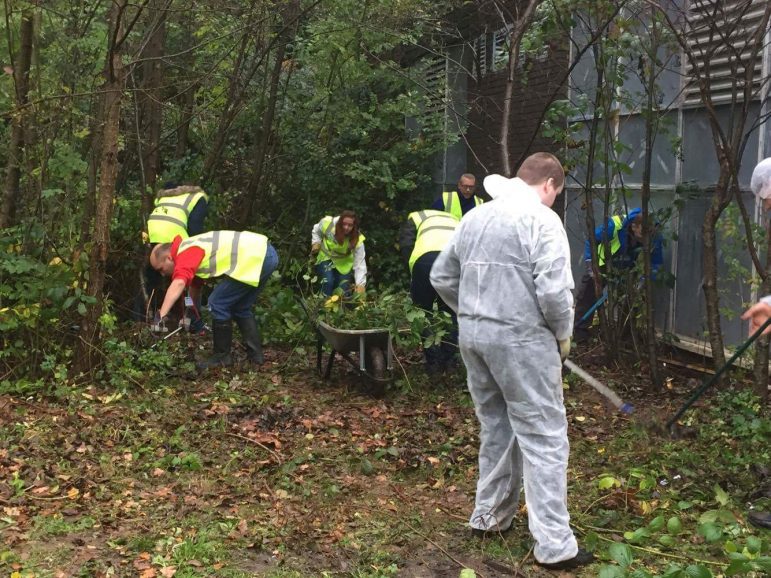 The garden makeover at Cwmbran High School took place on a wet day