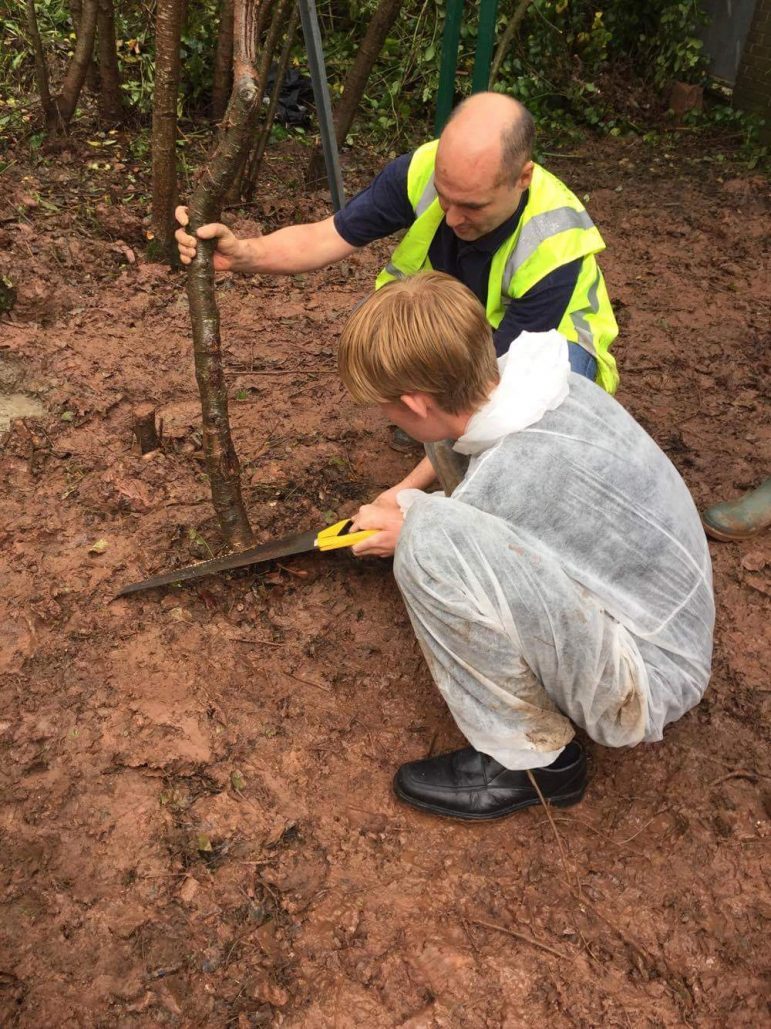 Pupils joined in and helped the volunteer transform their garden at Cwmbran High School