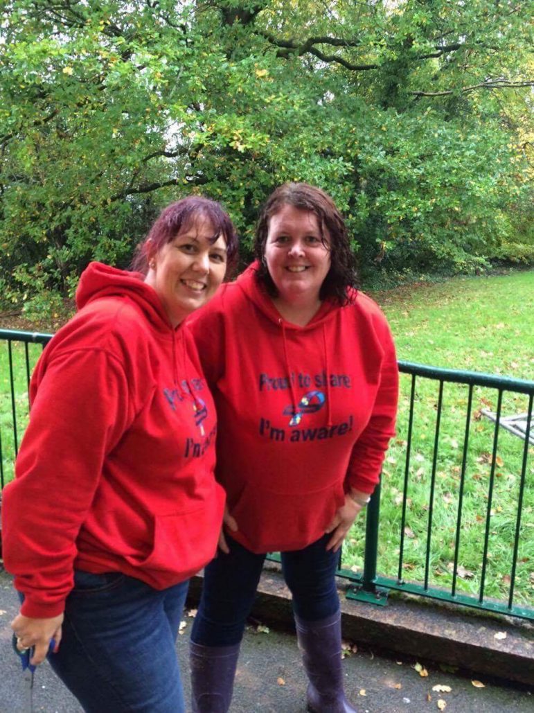 Staff from the autism base at Cwmbran High School take a break during the garden makeover