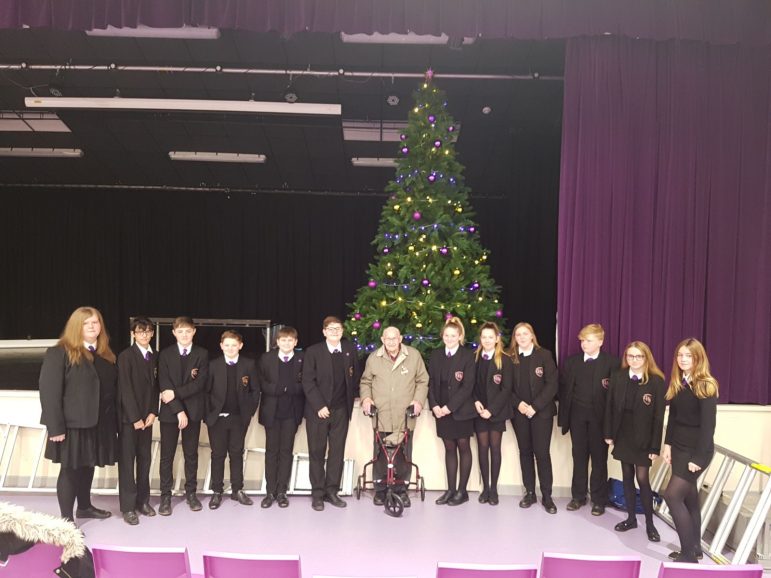 Ron Jones with pupils at Cwmbran High School