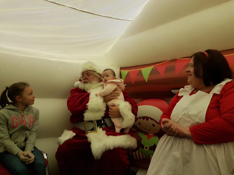 Children meeting Father Christmas