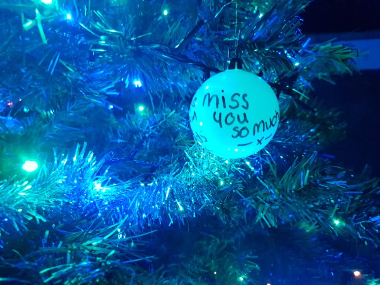 Residents have put messages to late friends and family on the tree