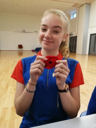 Poppies being knitted by the 2nd Fairwater Guides