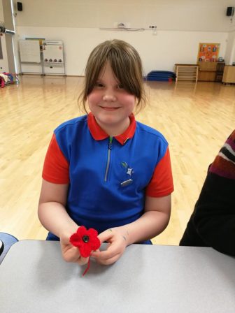 Poppies being knitted by the 2nd Fairwater Guides