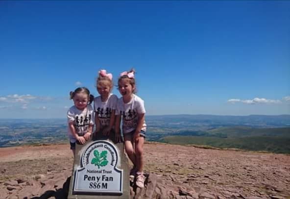 (l to r) Lilly Grace, Esmee and Addiena  on the top of Pen y Fan