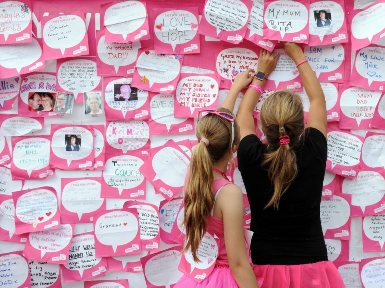 Handwritten dedications at a Race for Life event