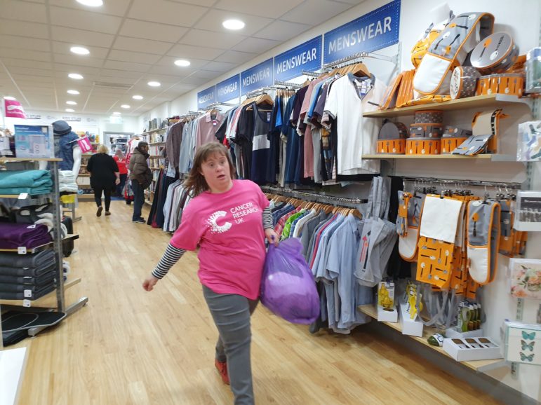 A volunteer in Cancer Research UK's Cwmbran shop