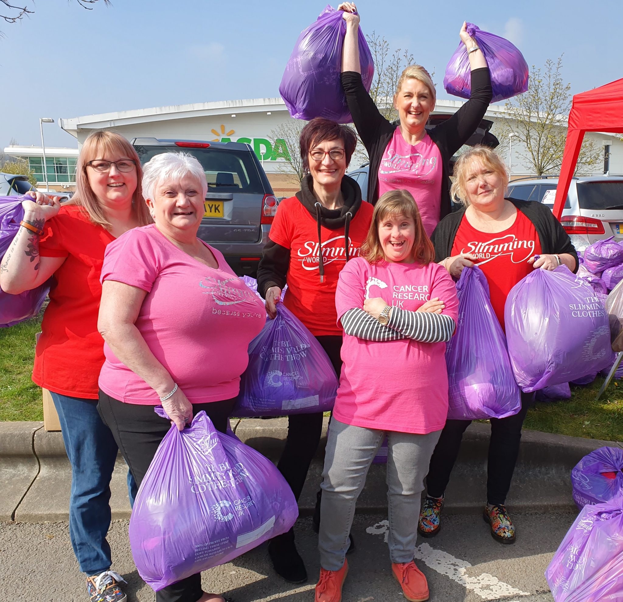 Slimming World members and Leigh (front row, second from right) from Cancer Research UK's Cwmbran shop