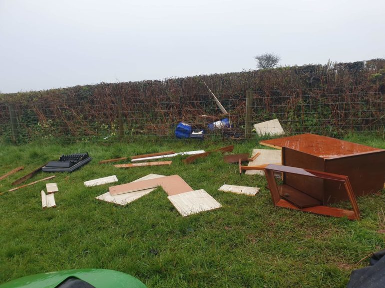 Flytipping in a field in Cwmbran