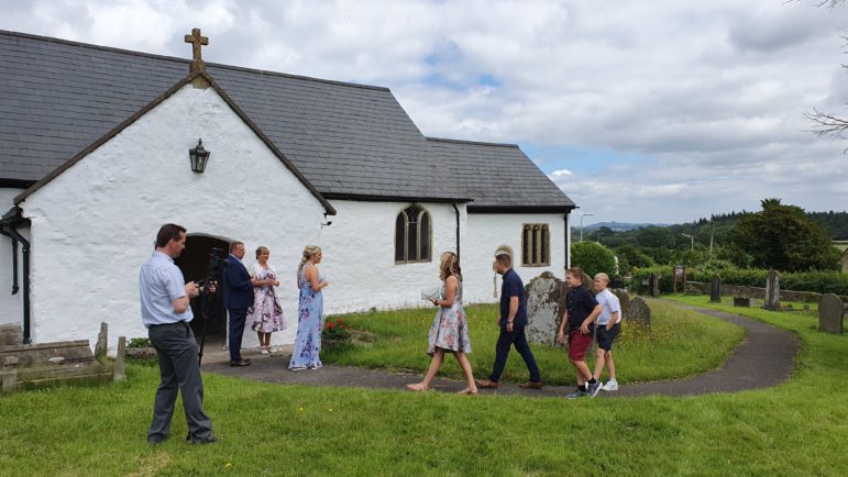 Guests being to arrived for the christening at St Peter's Church