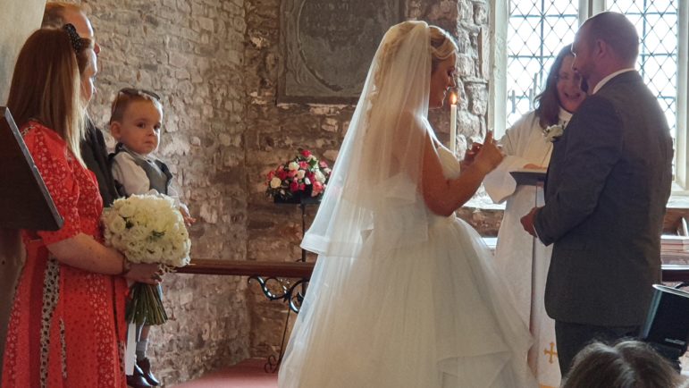 Freddy watches his mum and dad getting married moments after he was christened