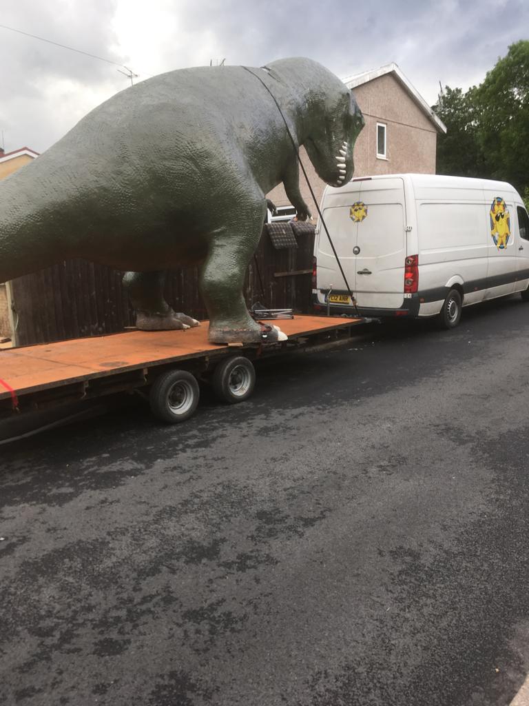 The Cwmbran dinosaur on a trailer