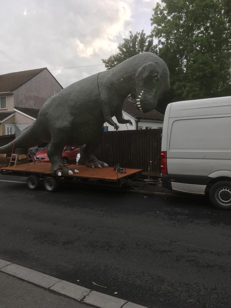 The Cwmbran dinosaur on a trailer