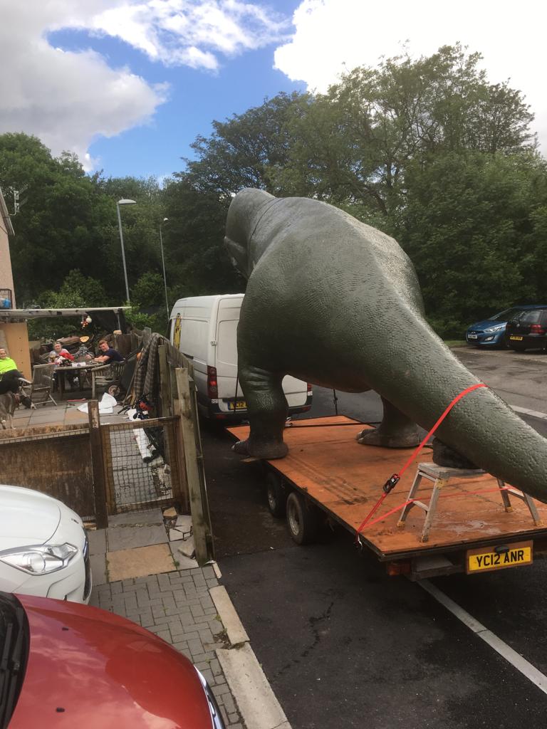 The Cwmbran dinosaur on a trailer
