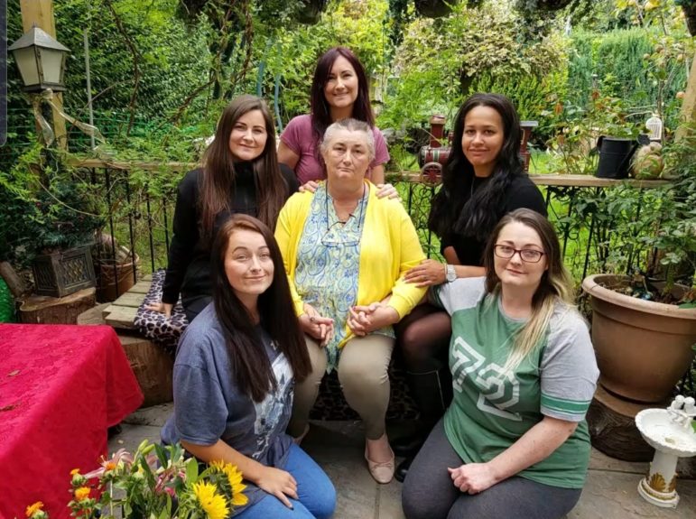 Lesley Adams, centre, with her and Jerry's five daughters