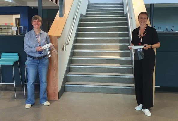 Mrs J Davies, head of design and technology, and Vicky Harris, acting deputy head, with some of the visors