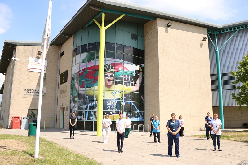 Staff outside the National Velodrome of Wales
