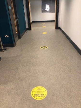 Two-metre remind stickers in Croesyceiliog School