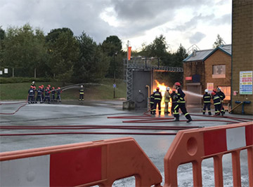 Fire cadets from Cwmbran taking part in a simulated fire