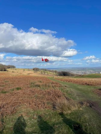 The Air Ambulance landing on Mynydd Maen