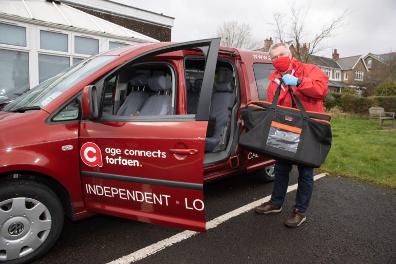 Food being loaded into a van