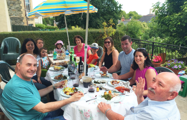 Joe and his family at a table