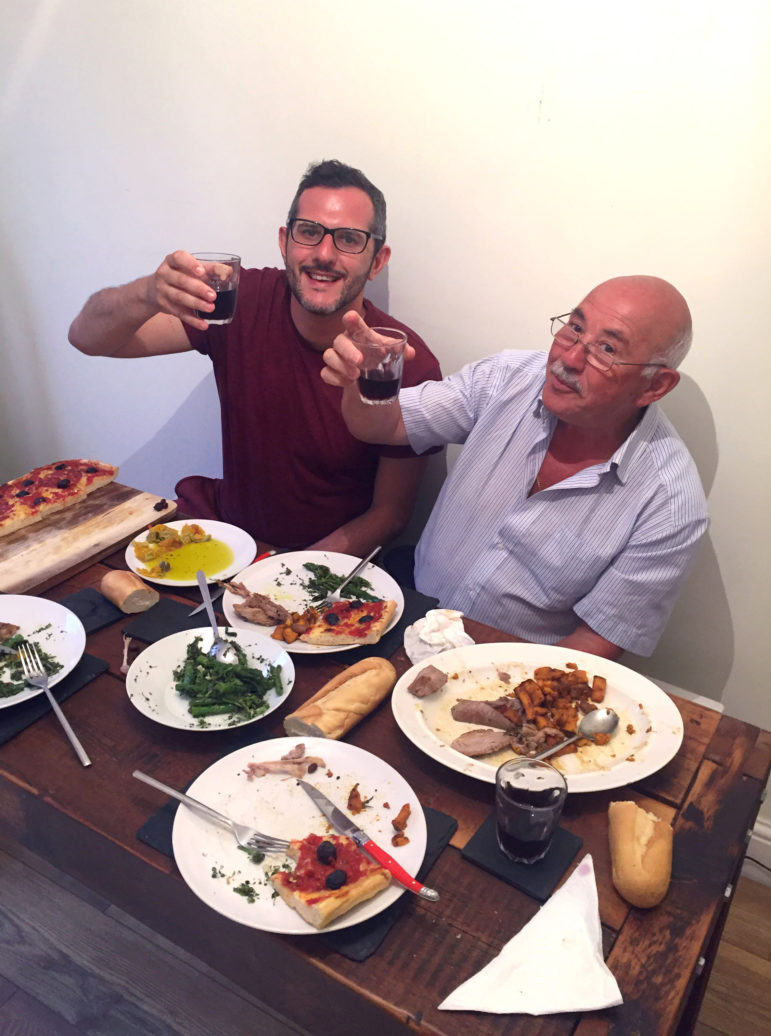 Joe and Claudio raising a glass