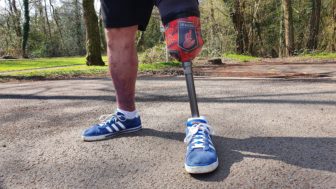 Barrie Evans' leg with the Dragons' badge