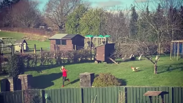 Boy running in garden