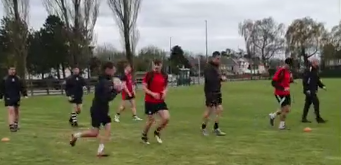 Rugby players passing a ball