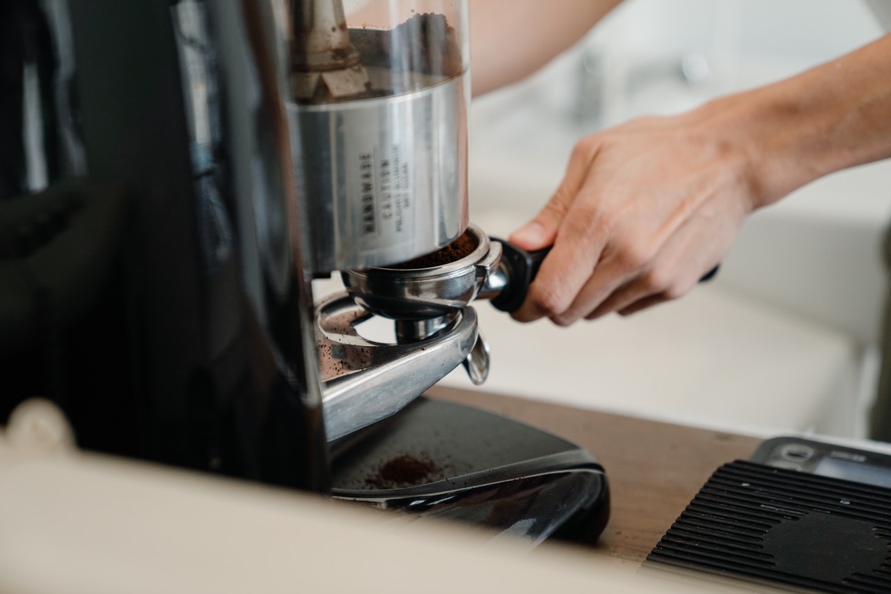 Person making coffee