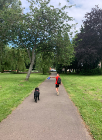 Michael walking with his dog