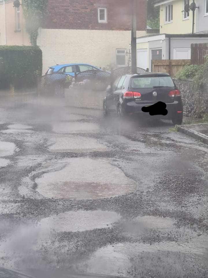 Water-filled potholes on Brook Street in Cwmbran