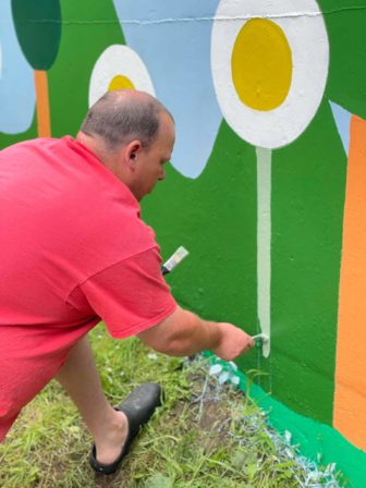 A man painting a wall