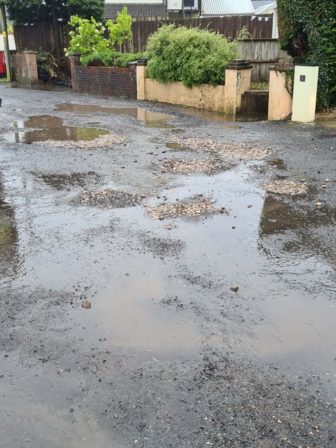 Water-filled potholes on Brook Street in Cwmbran