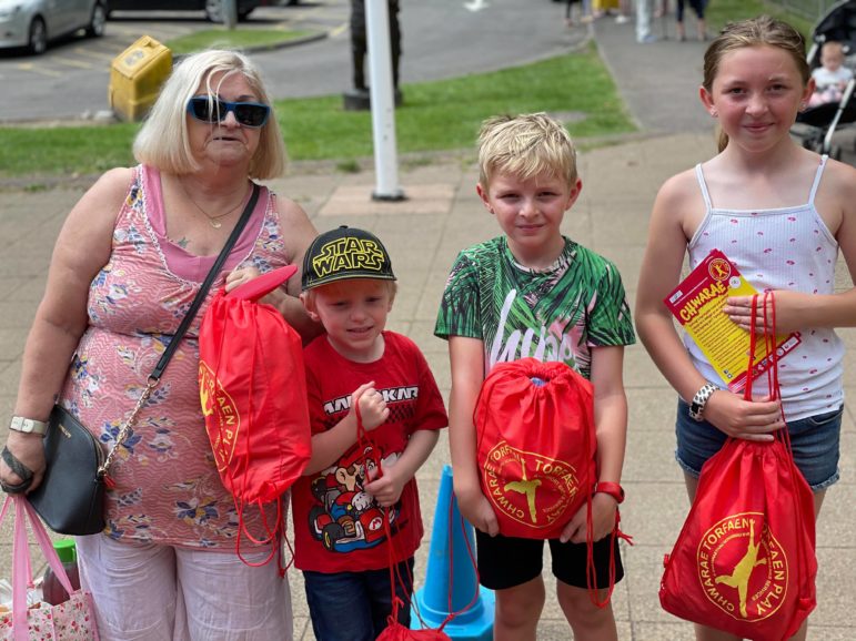 A family with their play packs