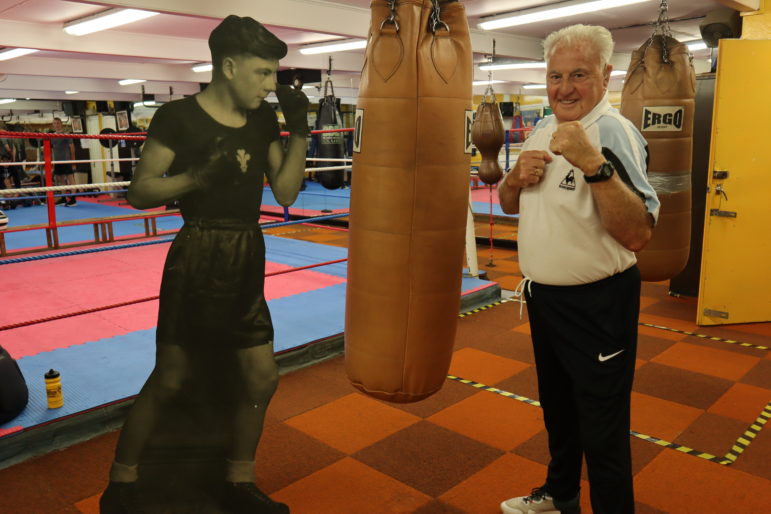 Keith Jefferies with a cardboard cutout of himself boxing