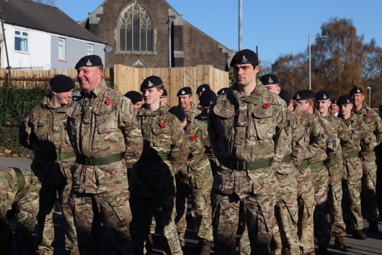 Soldiers getting ready to march