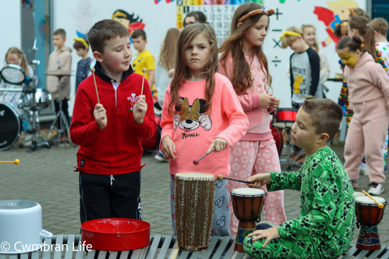 Children playing the drums
