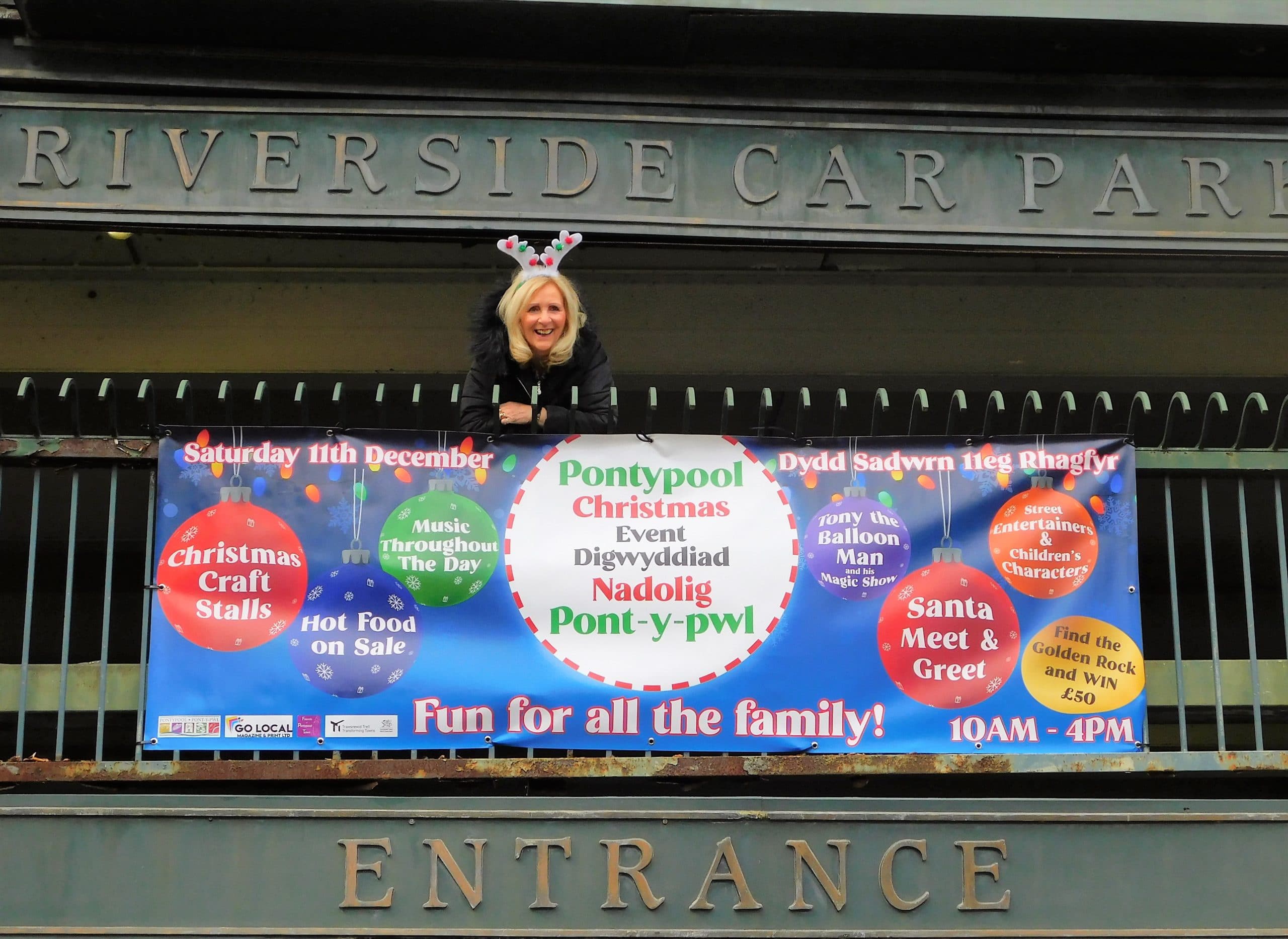 Pam Appleby, from the Friends of Pontypool Town Centre with a banner promoting the event.
