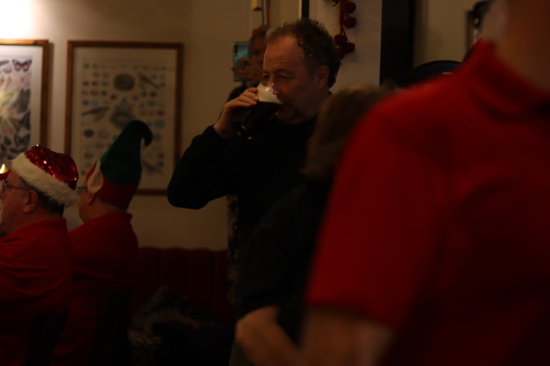 man drinking a beer