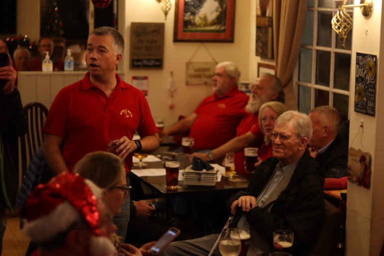 a group of people in a pub