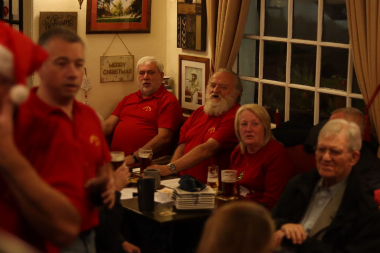 a group of people in a pub