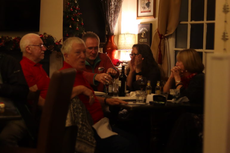 a group of people in a pub