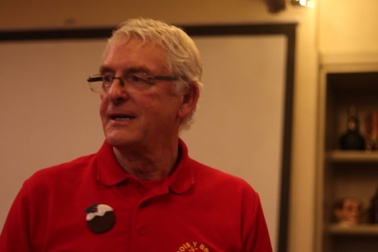 a man in red polo shirt