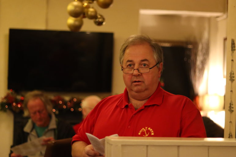 a man in a red polo shirt